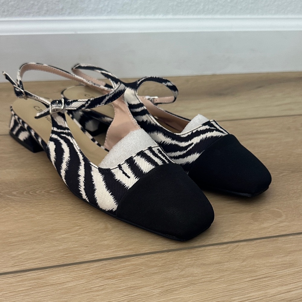 C. Paravano black and white sling back flats